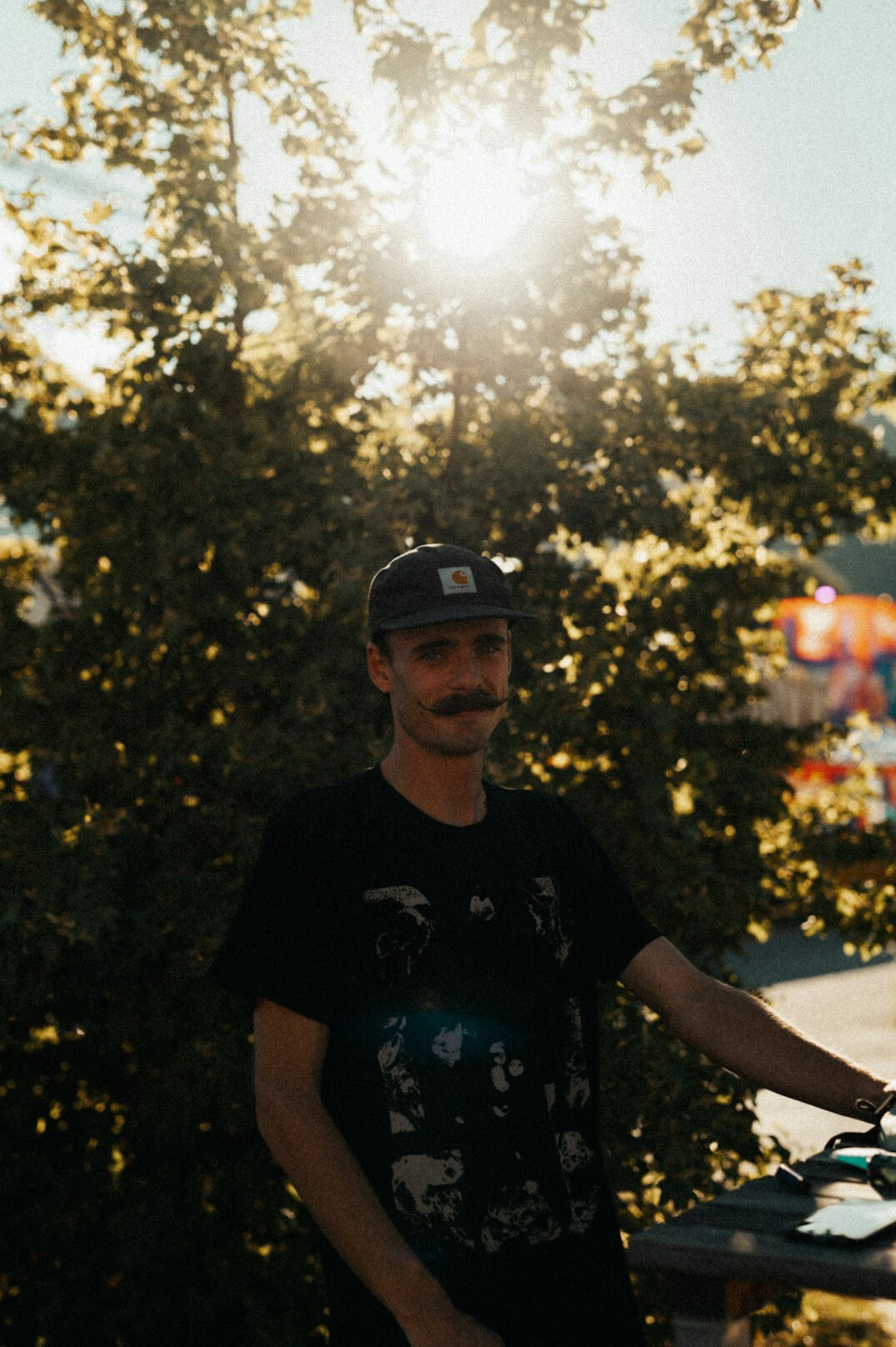 Portrait of a bearded man in casual shirt smiling